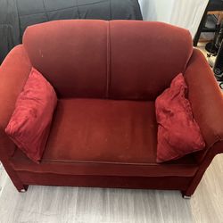 Red Loveseat with Pillows