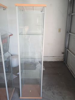 Tall glass case