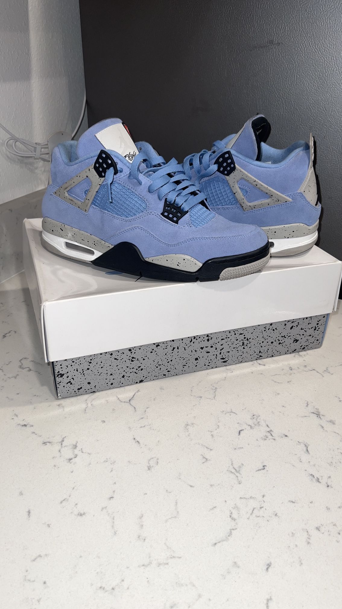 Jordan retro 4s UNC, Size 9.5