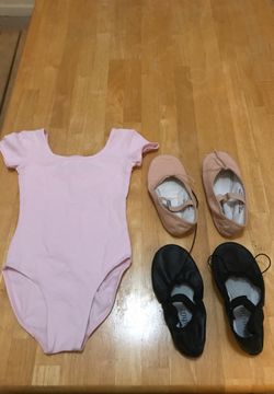 Pink leotard and two ballet slippers for sale