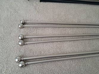 3 Silver Telescoping Curtain Rods with silver ball finials.