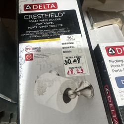 Delta toilet paper holder in brushed nickel 