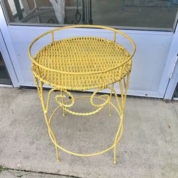 Pop of color to your garden metal plant stand with wicker