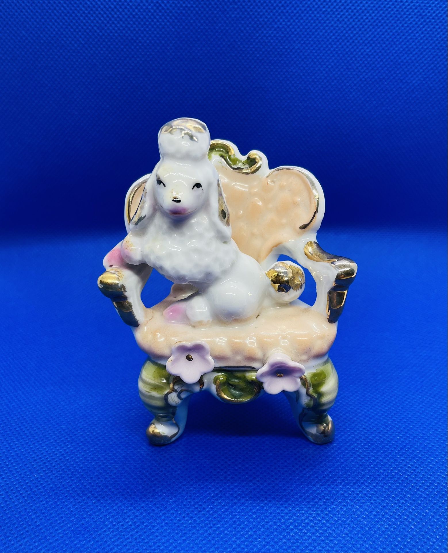 Antique Porcelain Poodle Figure Sitting On A Chair