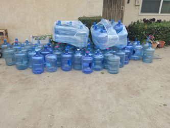Empty 5 gal water bottles $5