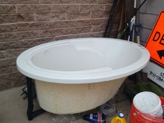 Oval Kohler soaking drop in bathtub