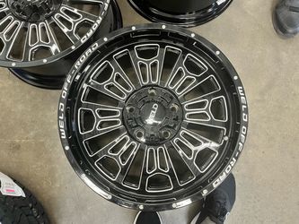 Weld Off-Road Gloss Black Milled Wheel and tires
