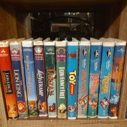 VCR AND 61 VHS Tapes