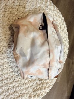 Vans fanny pack or waist bag with a tie-dye pattern PINK