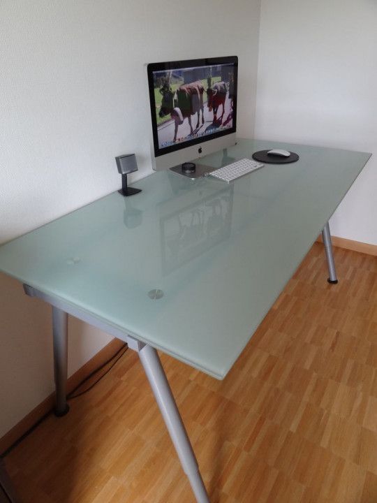 Frosted glass desk. Legs are height adjustable