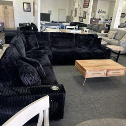 Sectional in large black corduroy