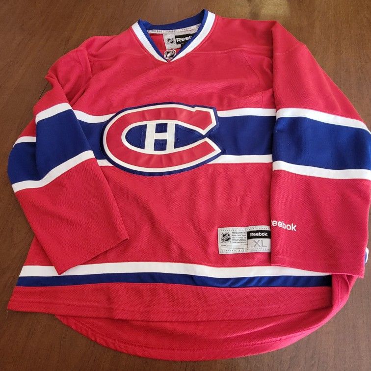 Vintage Reebok NHL Montreal Canadiens Hockey Jersey Size XL Mens. 
Pre-owned, good shape, please see photos for details.
Arm pit to arm pit 27.5", len