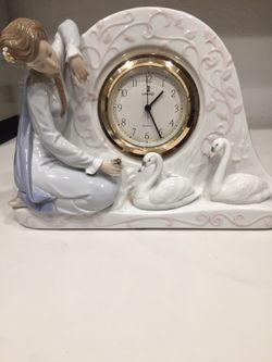 Lladró Porcelain figure and clock