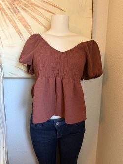 Women’s new top size large