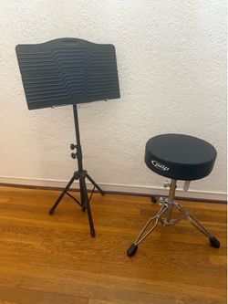 Drum throne and sheet music stand