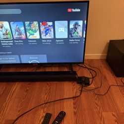 Used 42″ TCL smart TV with a sound bar + subwoofer bundle