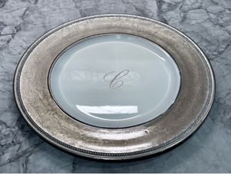 Set of 12 silver rimmed “C” chargers