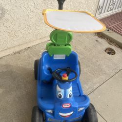 Blue Little Tikes Pushing Car