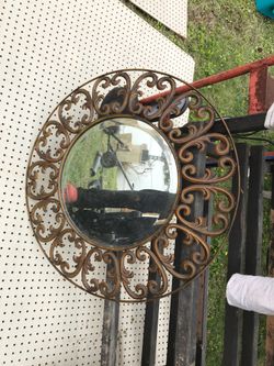 Heavy metal framed mirror beveled glass