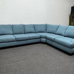 Living Spaces Teal Blue/Green cuddler corner contour arm. We deliver & setup.