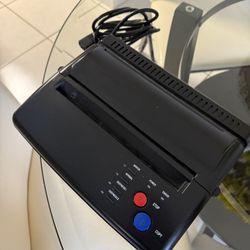 tattoo thermal stencil machine, also known as a tattoo transfer machine or copier. 