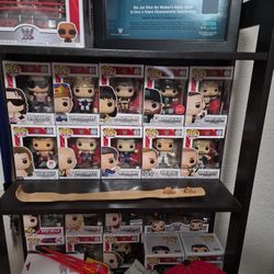 10 highly collectible wwe  funko pops shelf with back scratcher only