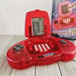 Vintage 600 Games in One Red Handheld Battery Operated Portable Travel Video Game System by ProTech Computer Game & Entertainment System in the Origin