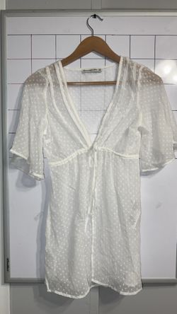 White polka dot sheer blouse with tie front