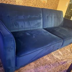 Blue suede couch