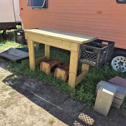 New Handmade Treated Wooden Workbench With Storage Crates On Both Sides 