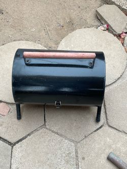 Tiny charcoal grill good for camping or apartment