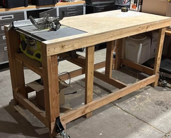 Very sturdy- mobile 6ft WOOD WORKBENCH with TABLE SAW built in.