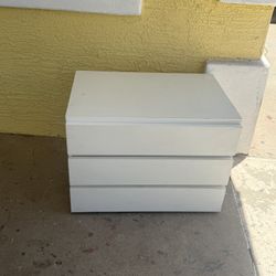 White three door dresser