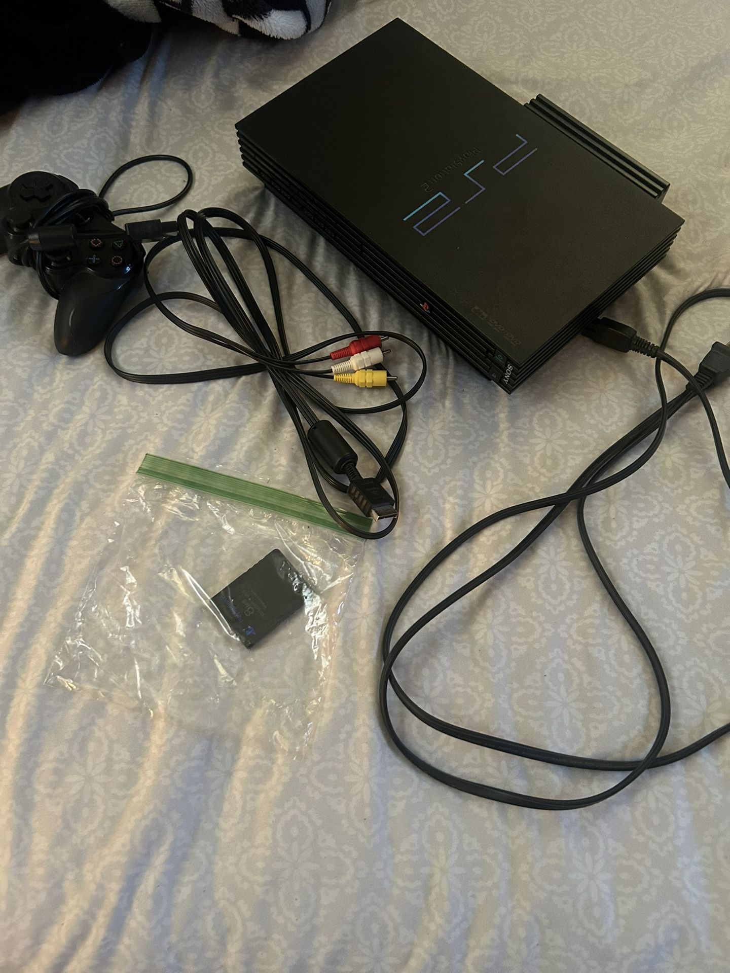 PlayStation 2 with controller & games