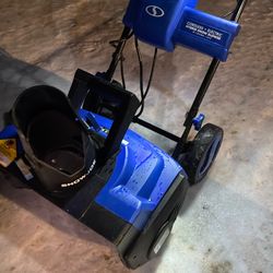 Snow Jo     Hybrid Snow Blower.   (Brand New).