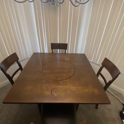 Large dinner table with 4 chairs
