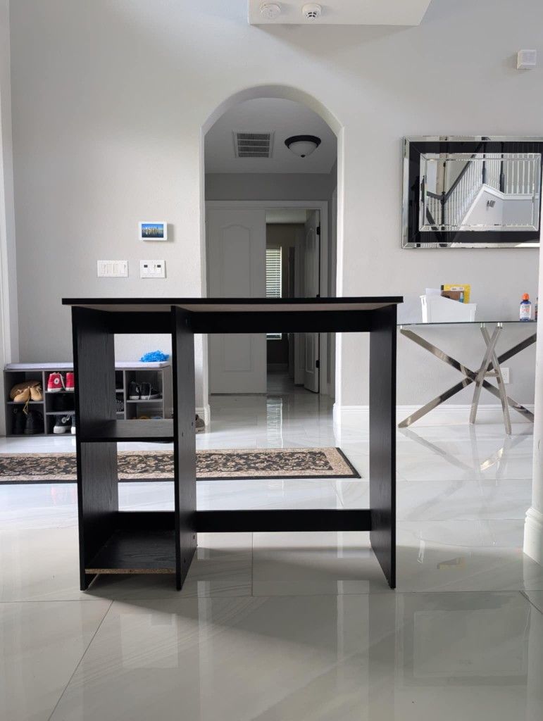 Black Desk With Storage Cabinet's Included And A Black Rolling Chair