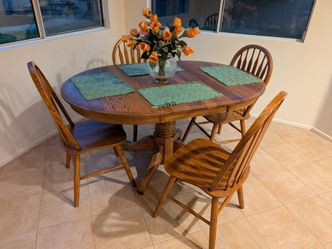 Oak dining table and 4 chairs