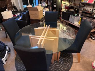 Round glass midcentury dining table with 4 chairs