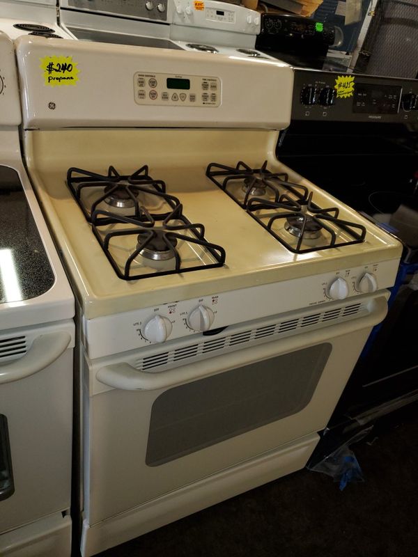 GE gas stove propane gas beige working perfectly four months warranty
