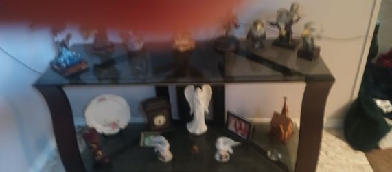 Glass entertainment center with black