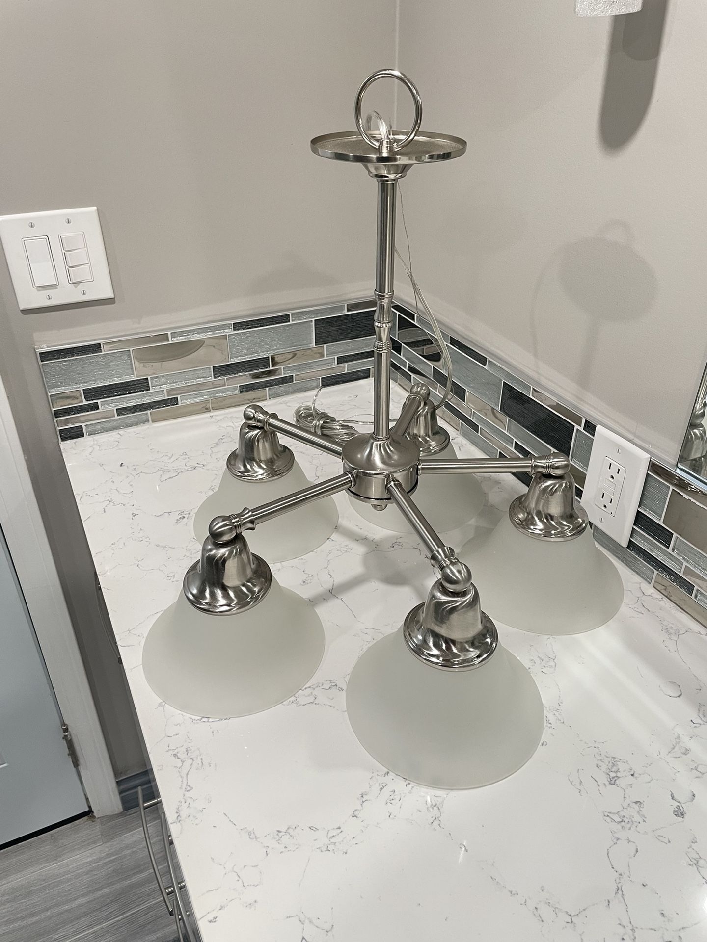 Brushed Nickel Chandelier with Frosted Glass.