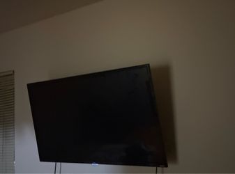 43 inch TCL TV plus TV wallmount