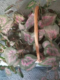 Artificial Silk Leaves In A Basket