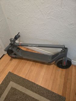 Phantom Go Go electic scooter and charger