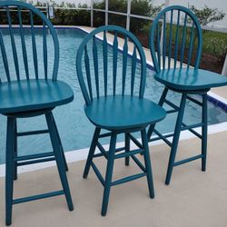 Three Wood Swivel Bar Stools