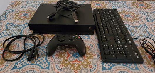 Xbox One X + Keyboard and HDMI cable -purchased before summer