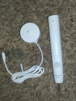 Phillips sonicare toothbrush with charging stand and if I'm correct its the sonicare prestige which is the corvette of electric toothbrushes