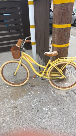 Yellow Cruiser Bicycle with Front Basket