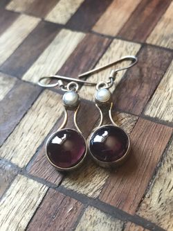 Real silver earrings made by crafts person